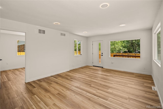 261 Knox Ct, Denver, CO 80219 - spare room with light wood-style flooring and recessed lighting