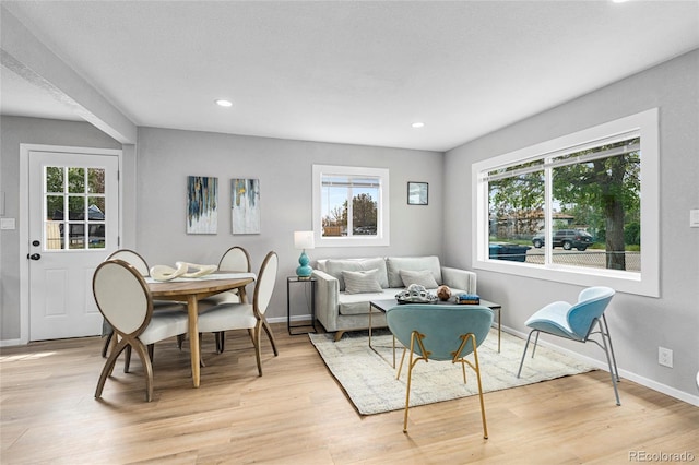 6980 Niagara St, Commerce City, CO 80022 - living area with healthy amount of natural light, baseboards, light wood-style flooring, and recessed lighting