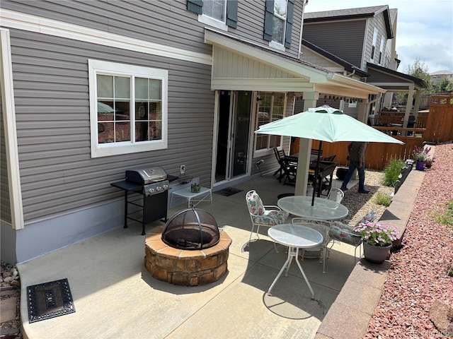 2115 Coach House Loop, Castle Rock, CO 80109 - view of patio / terrace featuring an outdoor fire pit, outdoor dining space, and grilling area