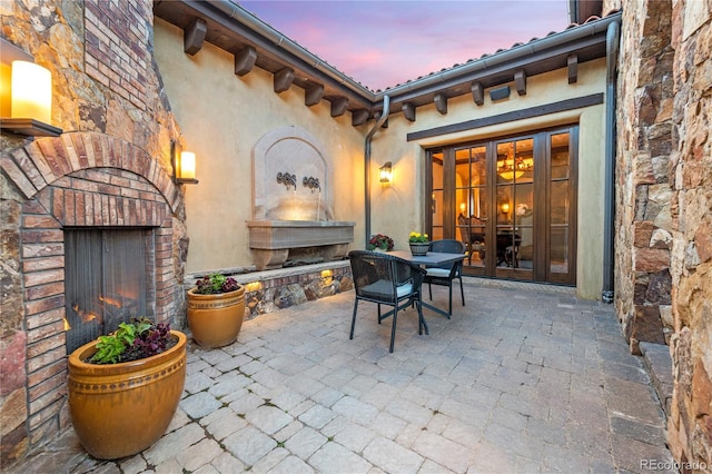 patio terrace at dusk with french doors