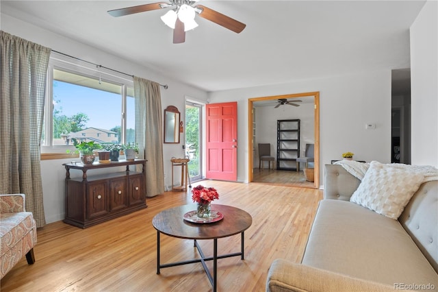 8481 E Briarwood Blvd, Centennial, CO 80112 - living area with ceiling fan and light wood-type flooring