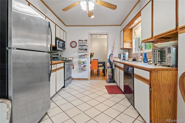 8481 E Briarwood Blvd, Centennial, CO 80112 - kitchen featuring stainless steel appliances, light countertops, ceiling fan, white cabinets, and light tile patterned floors