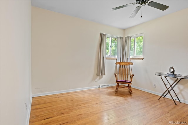 8481 E Briarwood Blvd, Centennial, CO 80112 - sitting room with light wood finished floors and a ceiling fan