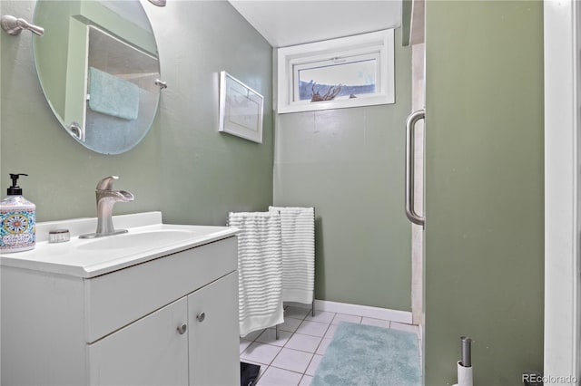 8481 E Briarwood Blvd, Centennial, CO 80112 - full bath featuring tile patterned floors, vanity, and a shower with door