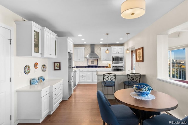 1200 N Humboldt St Unit 1003, Denver, CO 80218 - dining area featuring wood finished floors and recessed lighting