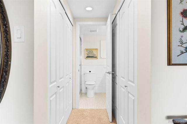 1200 N Humboldt St Unit 1003, Denver, CO 80218 - bathroom with a closet, toilet, and recessed lighting
