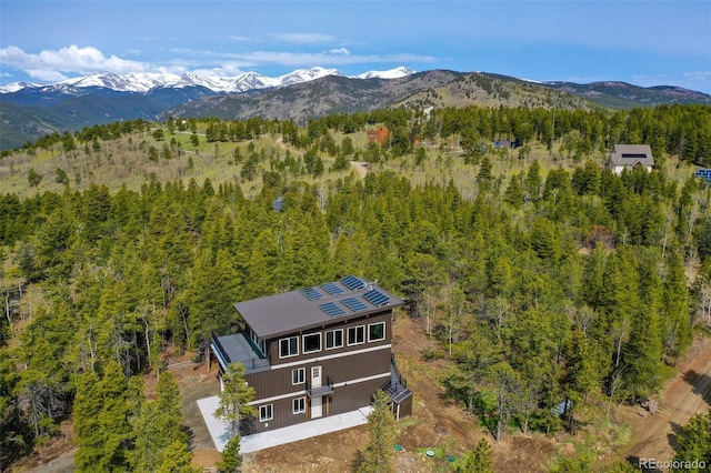 586 Alpine Way, Idaho Springs, CO 80452 - view from above of property with a forest and a mountainous background