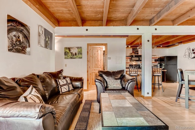 2300 Lodge Pole Cir Unit 103, Silverthorne, CO 80498 - living room with beam ceiling, wooden ceiling, and wood finished floors