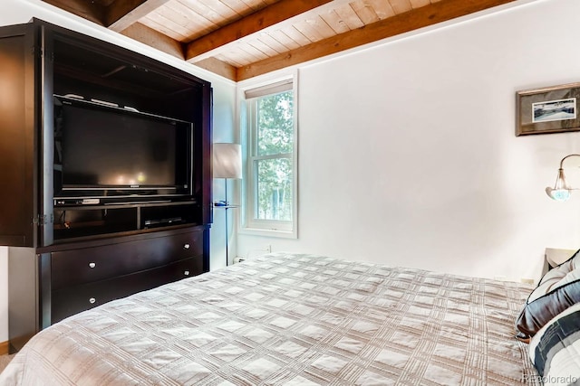 2300 Lodge Pole Cir Unit 103, Silverthorne, CO 80498 - bedroom featuring beam ceiling and wooden ceiling