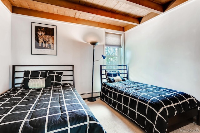 2300 Lodge Pole Cir Unit 103, Silverthorne, CO 80498 - bedroom featuring wooden ceiling, carpet floors, beamed ceiling, and a baseboard heating unit