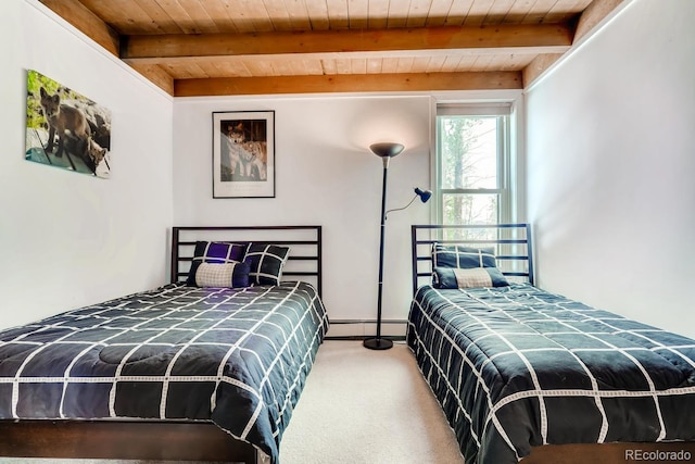 2300 Lodge Pole Cir Unit 103, Silverthorne, CO 80498 - carpeted bedroom with baseboard heating, wooden ceiling, and beamed ceiling