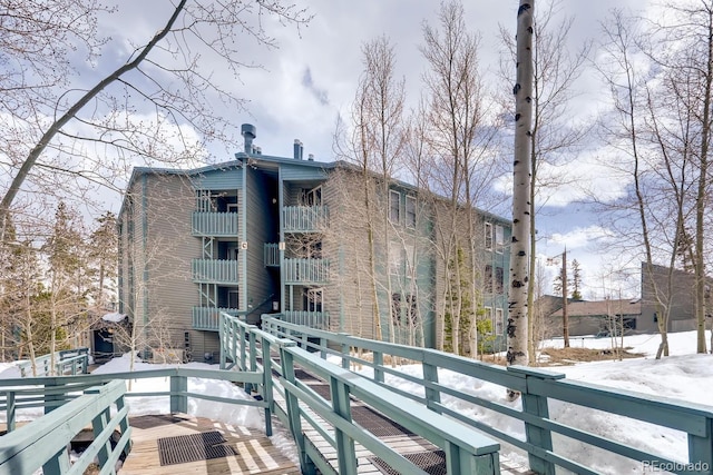 2300 Lodge Pole Cir Unit 103, Silverthorne, CO 80498 - view of snow covered back of property