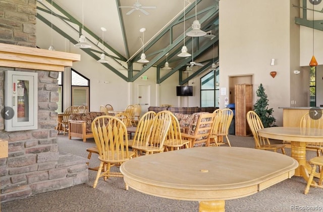 2300 Lodge Pole Cir Unit 103, Silverthorne, CO 80498 - dining area with high vaulted ceiling, ceiling fan, and carpet flooring