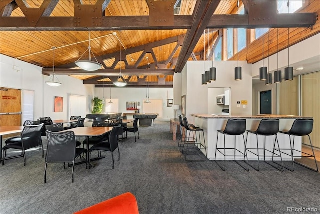 dining area featuring wood ceiling, carpet, beamed ceiling, and high vaulted ceiling