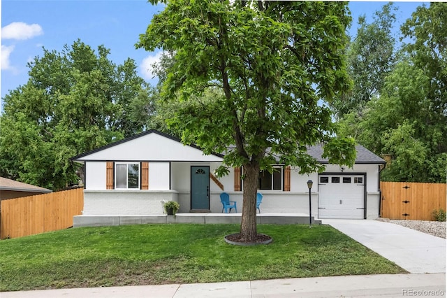 10067 W 68th Pl, Arvada, CO 80004 - view of front of house with a garage, driveway, brick siding, and roof with shingles