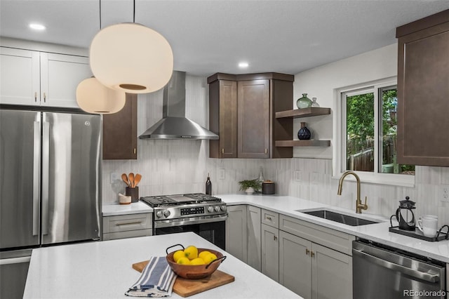 10067 W 68th Pl, Arvada, CO 80004 - kitchen featuring appliances with stainless steel finishes, wall chimney range hood, dark brown cabinetry, tasteful backsplash, and open shelves