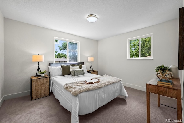 10067 W 68th Pl, Arvada, CO 80004 - carpeted bedroom featuring baseboards