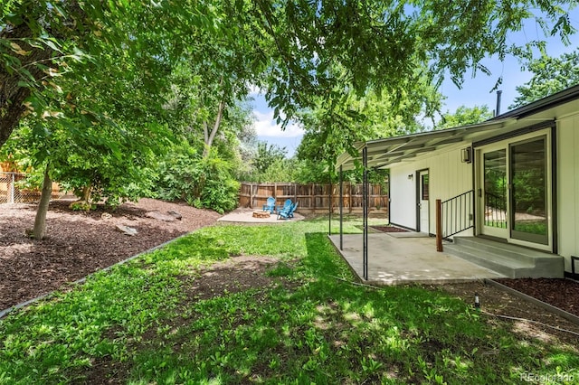 10067 W 68th Pl, Arvada, CO 80004 - fenced backyard with a patio