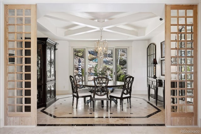 26806 Evergreen Springs Rd, Evergreen, CO 80439 - dining space featuring inlaid floor details, a chandelier, and tile patterned flooring