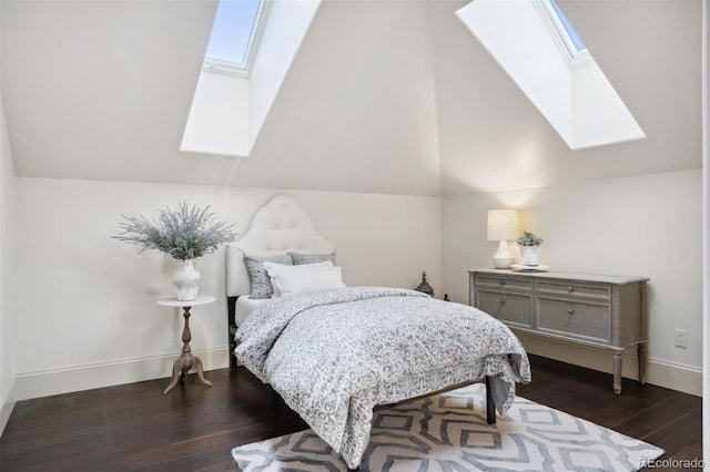 26806 Evergreen Springs Rd, Evergreen, CO 80439 - bedroom with a skylight, dark wood finished floors, and vaulted ceiling