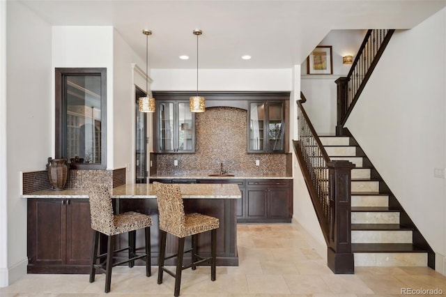 26806 Evergreen Springs Rd, Evergreen, CO 80439 - indoor wet bar with stairs, backsplash, pendant lighting, and recessed lighting