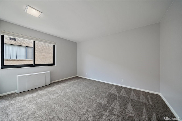 1050 N Corona St Unit 202, Denver, CO 80218 - carpeted empty room with baseboards