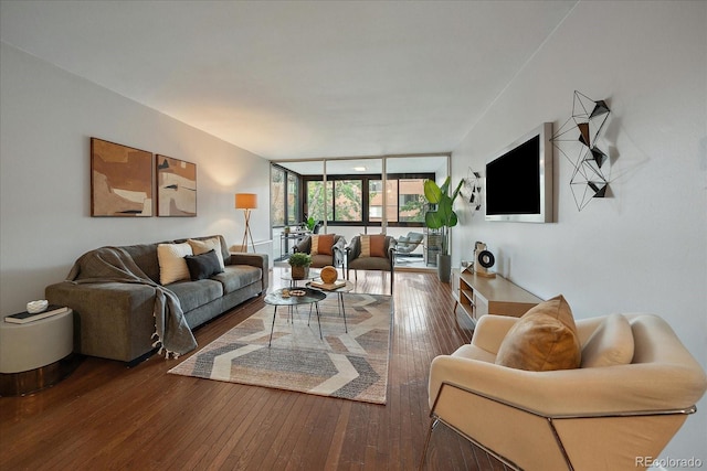 1050 N Corona St Unit 202, Denver, CO 80218 - living area with expansive windows and wood-type flooring