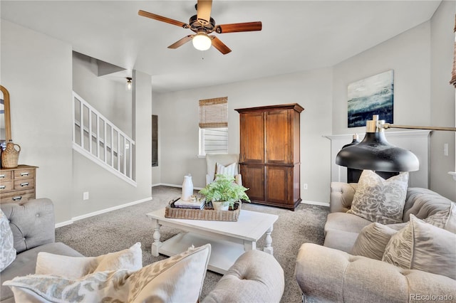 living room with light colored carpet and ceiling fan