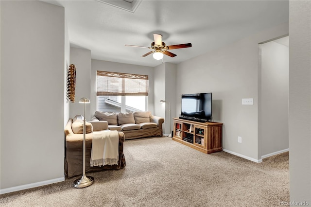 living room with carpet and ceiling fan