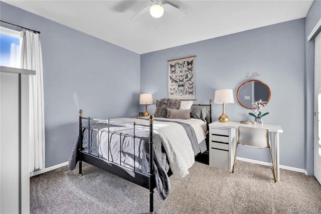 bedroom with ceiling fan and carpet flooring