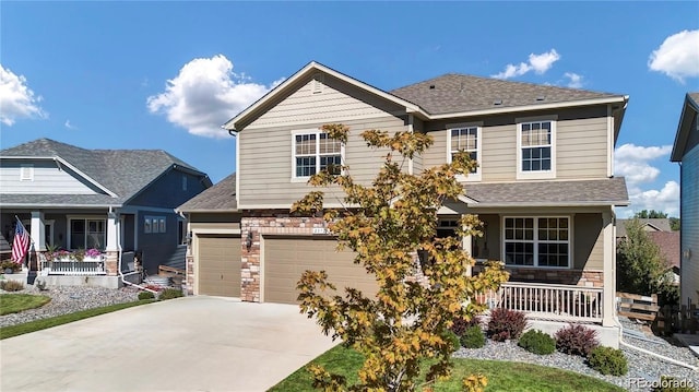 craftsman inspired home with a porch and a garage