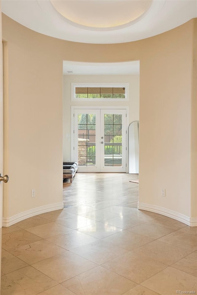 155 S Poplar St, Denver, CO 80230 - empty room featuring baseboards and french doors