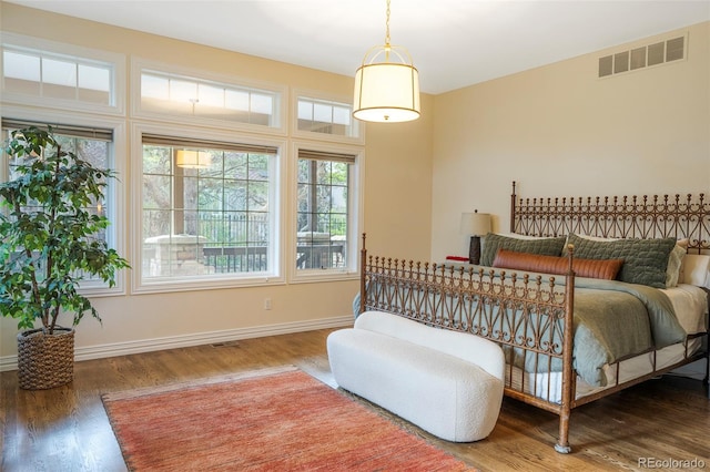 155 S Poplar St, Denver, CO 80230 - bedroom with wood finished floors and baseboards