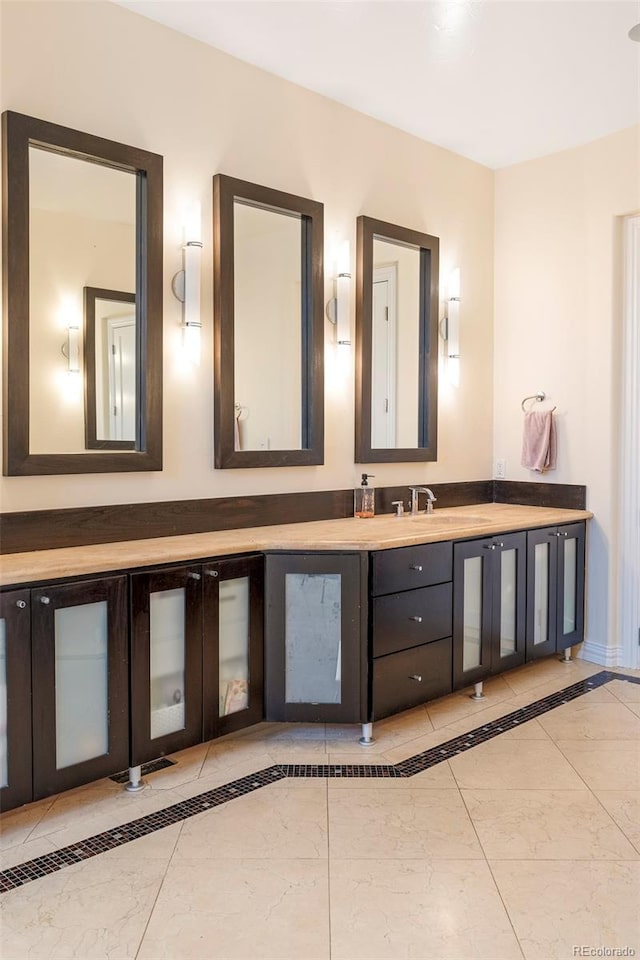 155 S Poplar St, Denver, CO 80230 - bathroom with double vanity and baseboards