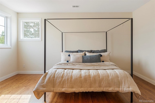 155 S Poplar St, Denver, CO 80230 - bedroom featuring wood finished floors and baseboards