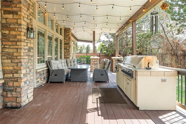 155 S Poplar St, Denver, CO 80230 - wooden terrace featuring an outdoor living space, a fenced backyard, a grill, and area for grilling