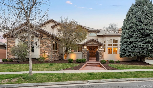155 S Poplar St, Denver, CO 80230 - craftsman-style house with stone siding and stucco siding