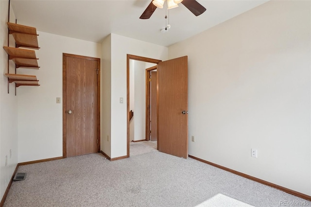 5612 S Jebel Way, Centennial, CO 80015 - unfurnished bedroom featuring light colored carpet, baseboards, a ceiling fan, and a closet