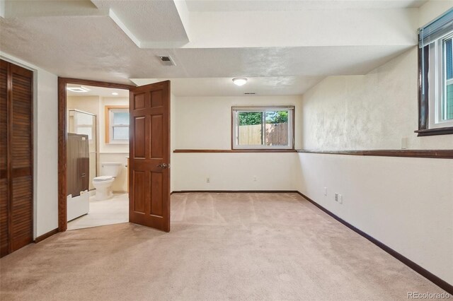 5612 S Jebel Way, Centennial, CO 80015 - carpeted spare room featuring baseboards and washer / clothes dryer