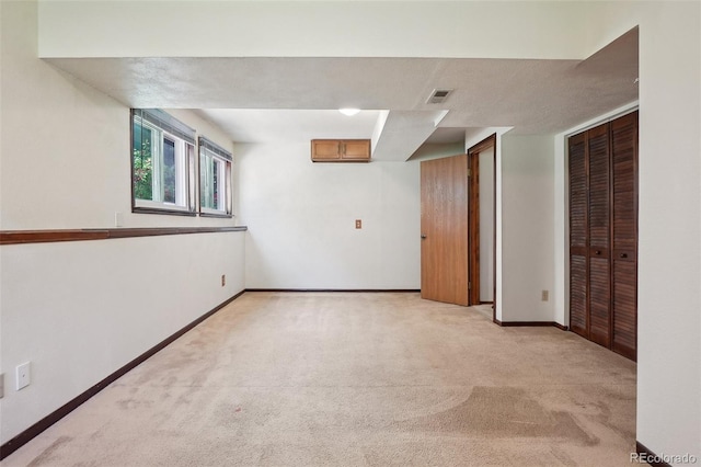 5612 S Jebel Way, Centennial, CO 80015 - below grade area featuring light carpet and baseboards