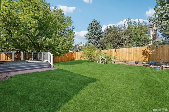 5612 S Jebel Way, Centennial, CO 80015 - view of yard with a wooden deck