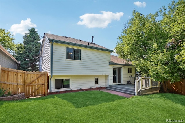 5612 S Jebel Way, Centennial, CO 80015 - rear view of house with a deck and a shingled roof