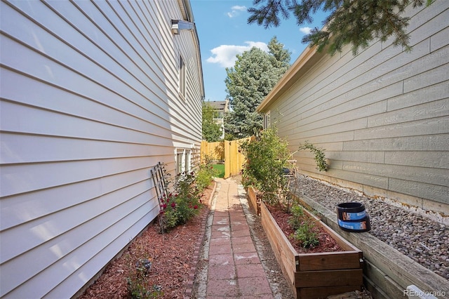5612 S Jebel Way, Centennial, CO 80015 - view of side of property with a garden
