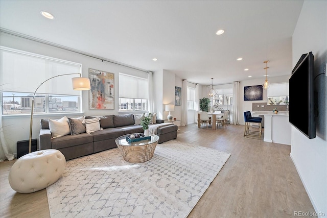 living room with light hardwood / wood-style floors