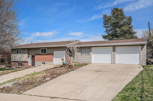 view of front facade with an attached garage and concrete driveway