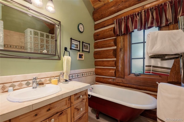 bathroom featuring vanity and a bathtub