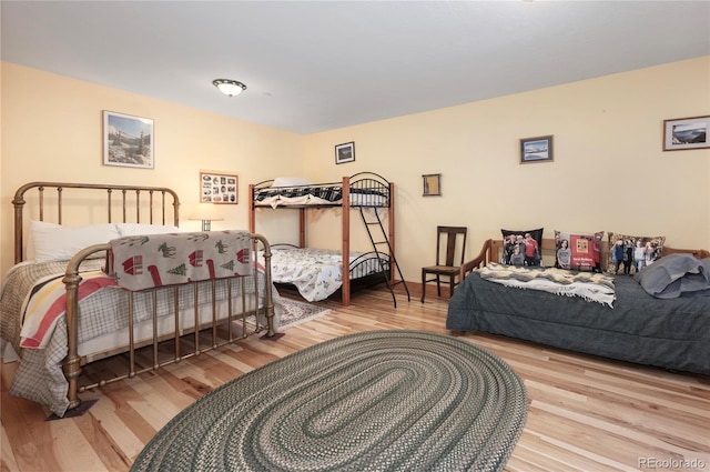 bedroom with light wood-type flooring