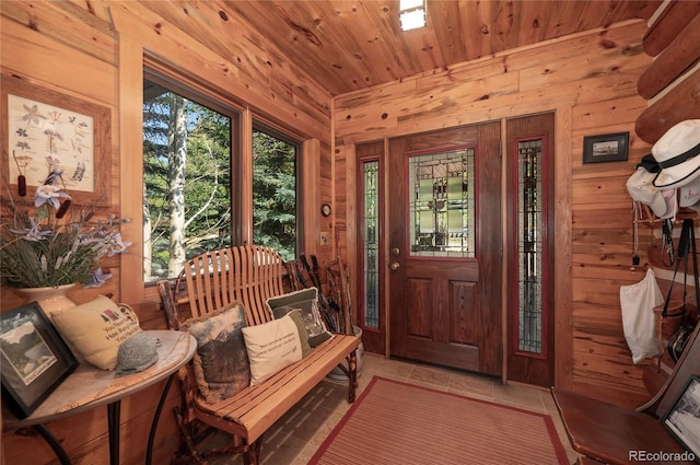 interior space with rustic walls and wood ceiling