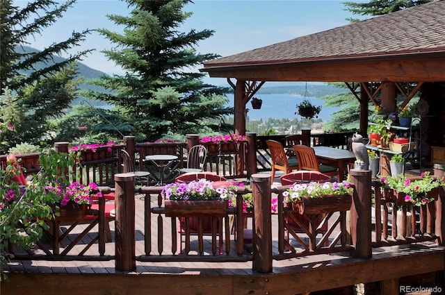 wooden terrace with a mountain view