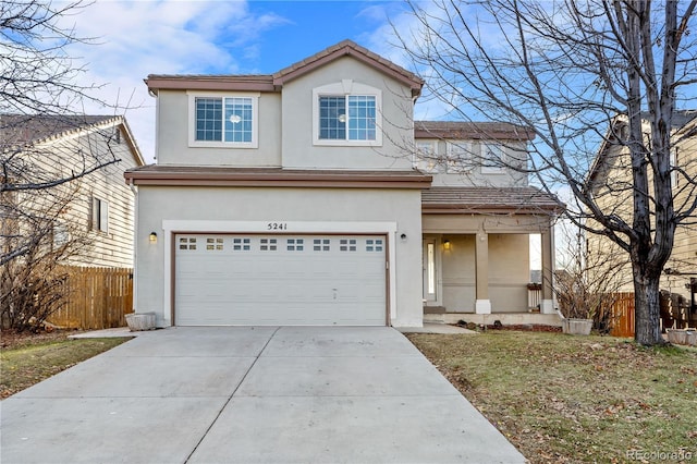 front of property with a garage